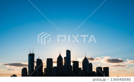都会のオフィスビル群のシルエット 136048090