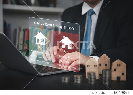 Rent vs buy, finance, Hands on laptop with hologram icons compare monthly rent, equity building, and growth, real estate blogs, calculators, and marketing. concepts of choice and investment strategy. Rent vs buy, finance, Hands on laptop with hologram icons compare monthly rent, equity building, and growth, real estate blogs, calculators, and marketing. concepts of choice and investment strategy. 136049068