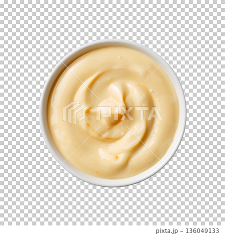Creamy Sauce Sits in a Small White Bowl on a Plain Background Ready for Use in Meals 136049133