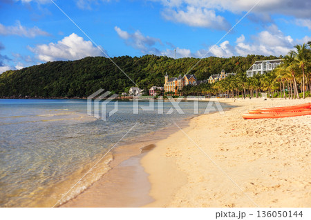 Iceland Phu Quoc Vietnam 5.7.2025. A beach with a clear blue ocean and a few orange kayaks Iceland Phu Quoc Vietnam 5.7.2025. A beach with a clear blue ocean and a few orange kayaks 136050144