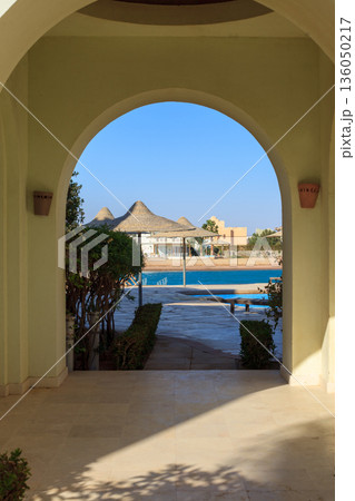 El Gouna Egypt 2.11.2025. A large archway leads to a pool area El Gouna Egypt 2.11.2025. A large archway leads to a pool area 136050217