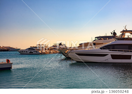 El Gouna Egypt 2.11.2025. A group of boats are docked in the water, with one of them being a large yacht El Gouna Egypt 2.11.2025. A group of boats are docked in the water, with one of them being a large yacht 136050248