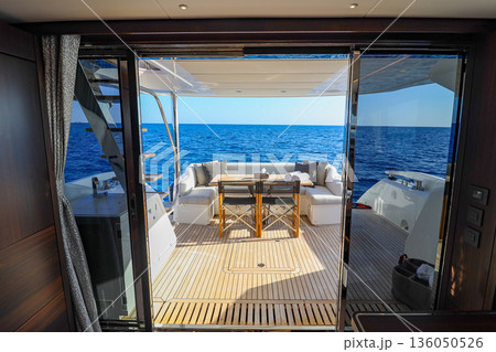 A boat with a large window overlooking the ocean A boat with a large window overlooking the ocean 136050526