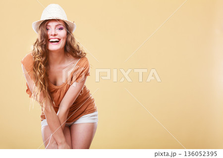Charming woman in summer clothes straw hat 136052395
