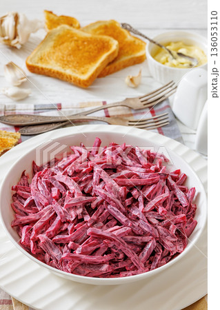 beet salad with mayo and garlic in bowl 136053110