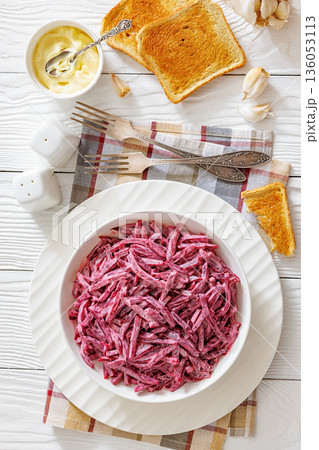 beet salad with mayo and garlic in bowl 136053113