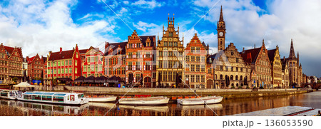 Ghent city historical center, tourists boats and colorful buildings on Leie river bank, Belgium Ghent city historical center, tourists boats and colorful buildings on Leie river bank, Belgium 136053590