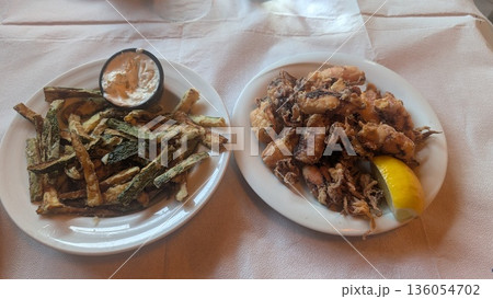 Fried zucchini and fried calamari 136054702