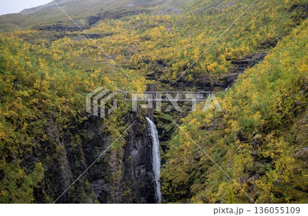 Autumn waterfall canyon with Gorsa Bridge above deep gorge in Norway Autumn waterfall canyon with Gorsa Bridge above deep gorge in Norway 136055109