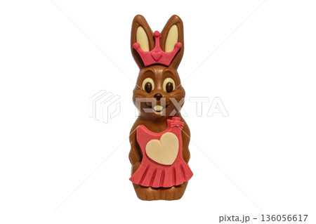 Chocolate easter bunny in a dress isolated on white background Chocolate easter bunny in a dress isolated on white background 136056617