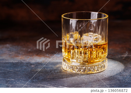 Glass of whiskey with ice Glass of whiskey with ice 136056872