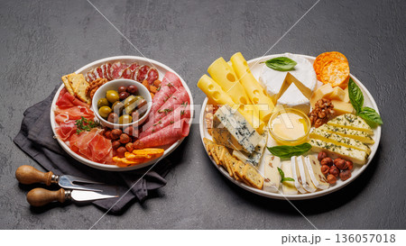 A selection of various cheeses and meats 136057018