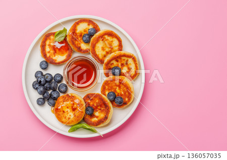 Homemade pancakes with blueberries and syrup 136057035