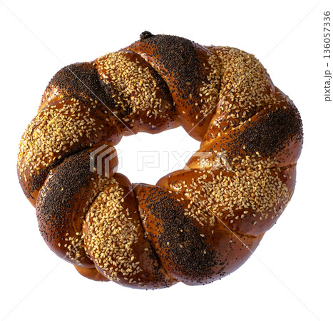 Sweet Slavic bun made in the shape of a ring and called Kalach 136057336