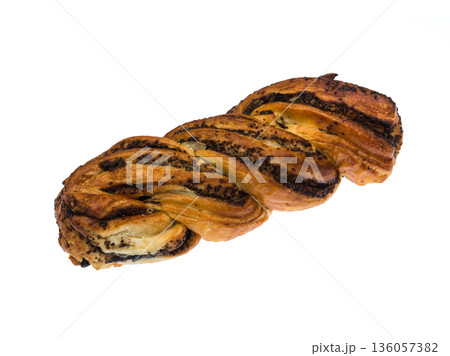 Ruddy, wicker bun with poppy seeds, on a white background in isolation 136057382