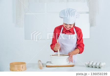 teen baker girl in chef uniform, menu teen baker girl in chef uniform, menu 136058199