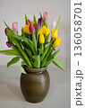 Colorful Spring Tulips Bouquet in Ceramic Vase 136058701