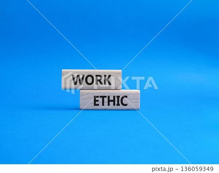 Work Ethic symbol. Concept words Work Ethic on wooden blocks. Beautiful blue background. Business and Work Ethic concept. Copy space. Work Ethic symbol. Concept words Work Ethic on wooden blocks. Beautiful blue background. Business and Work Ethic concept. Copy space. 136059349