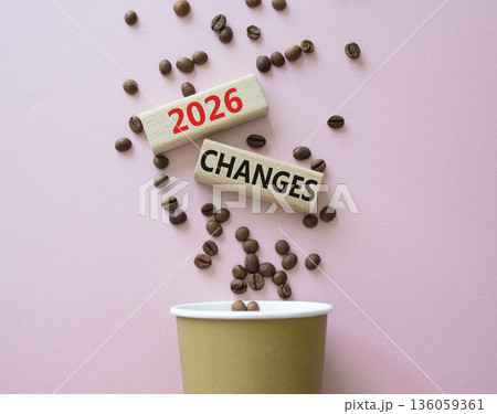 2026 Changes symbol. Concept words 2026 Changes on beautiful wooden picture frame. Beautiful pink background with coffee cup and coffee beans. Business and 2026 Changes concept. Copy space. 136059361
