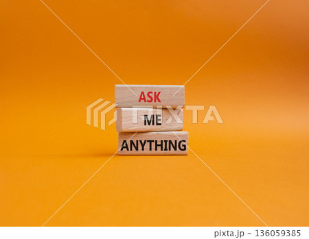 Question symbol. Concept words Ask me Anything on wooden blocks. Beautiful orange background. Business and Ask me Anything concept. Copy space Question symbol. Concept words Ask me Anything on wooden blocks. Beautiful orange background. Business and Ask me Anything concept. Copy space 136059385