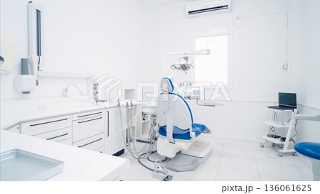 Dental clinic interior with modern equipment and chair Dental clinic interior with modern equipment and chair 136061625