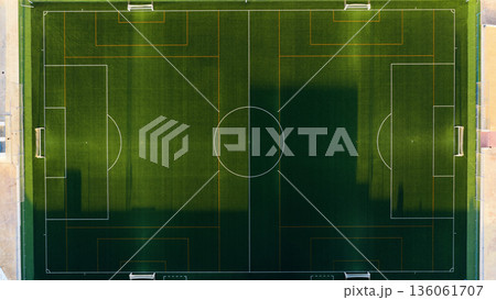 Empty green soccer field from aerial view 136061707