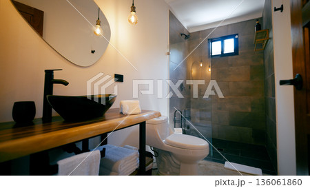 Modern bathroom interior combining natural wood and dark fixtures Modern bathroom interior combining natural wood and dark fixtures 136061860