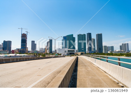 Bridge road over river on urban skyline Bridge road over river on urban skyline 136061949