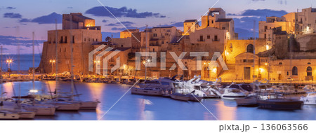 Castellammare del Golfo harbor and buildings at sunset in Sicily Italy Castellammare del Golfo harbor and buildings at sunset in Sicily Italy 136063566