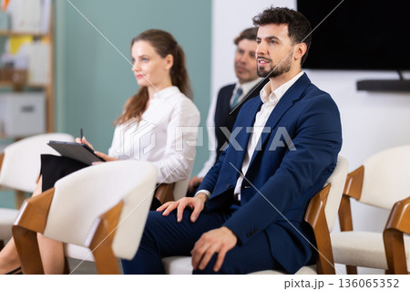 Group of businessmen participating in professional training class 136065352