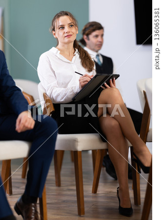 Group of businessmen participating in professional training class 136065381