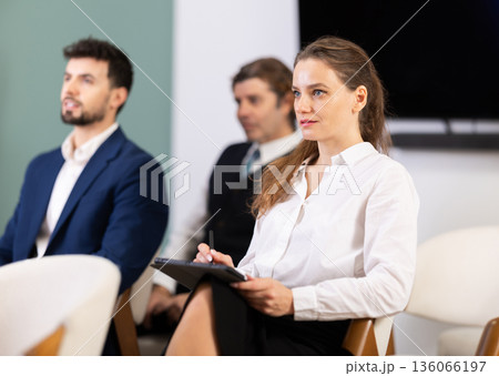 Group of businessmen participating in professional training class 136066197