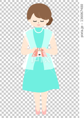 婚禮上，一位女士遞上一個禮物信封。 136067480