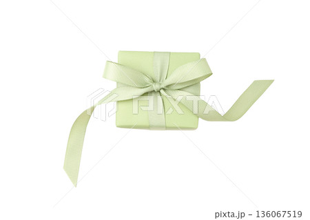 A lovely gift box wrapped in soft green ribbon, isolated, PNG A lovely gift box wrapped in soft green ribbon, isolated, PNG 136067519