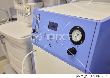 Medical infusion equipment, Clinical infusion pump with calibration features, Healthcare infusion system mounted on clean wall with adjustable flow and pressure controls Medical infusion equipment, Clinical infusion pump with calibration features, Healthcare infusion system mounted on clean wall with adjustable flow and pressure controls 136069293