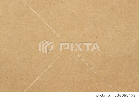 Brown cardboard sheet abstract background, texture of sepia color kraft paper with vintage pattern for design art work. 136069475