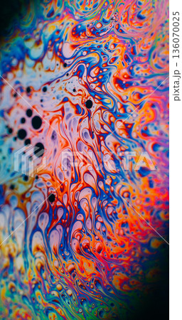 Gasoline texture defocused. Soap paint. Multicolor oil blob explosion on black background. Pigment droplet abstract stream blend spill. Gasoline texture defocused. Soap paint. Multicolor oil blob explosion on black background. Pigment droplet abstract stream blend spill. 136070025