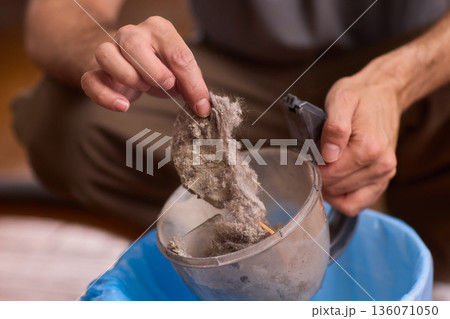 Deep cleaning process. Removing debris from filter meticulously. Detailed steps for effective lint elimination. Comprehensive guide to cleaning lint and dust from filters Deep cleaning process. Removing debris from filter meticulously. Detailed steps for effective lint elimination. Comprehensive guide to cleaning lint and dust from filters 136071050