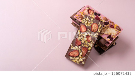 Minimal chocolate bar with freeze-dried berries Minimal chocolate bar with freeze-dried berries 136071435