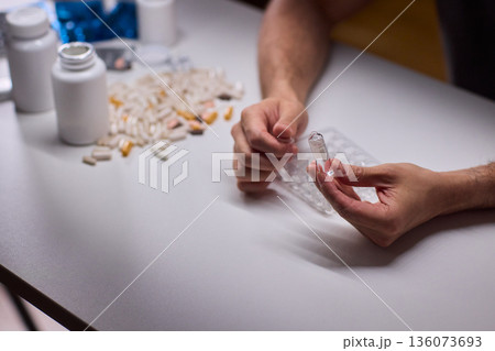 Cleaning and mixing medicines with precision craftsmanship, Detailed scene of meticulous drug processing involving tablet grinding and precise pharmaceutical handling Cleaning and mixing medicines with precision craftsmanship, Detailed scene of meticulous drug processing involving tablet grinding and precise pharmaceutical handling 136073693