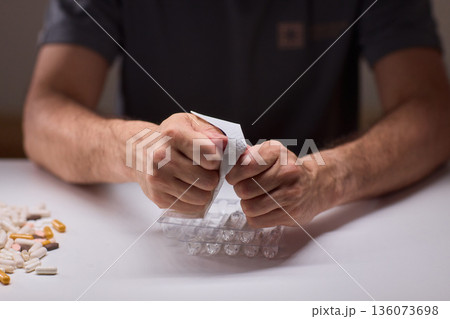 Cleaning and mixing medicines with precision craftsmanship, Detailed scene of meticulous drug processing involving tablet grinding and precise pharmaceutical handling Cleaning and mixing medicines with precision craftsmanship, Detailed scene of meticulous drug processing involving tablet grinding and precise pharmaceutical handling 136073698