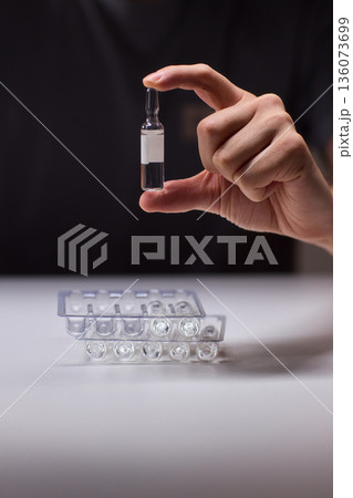 Cleaning and mixing medicines with precision craftsmanship, Detailed scene of meticulous drug processing involving tablet grinding and precise pharmaceutical handling Cleaning and mixing medicines with precision craftsmanship, Detailed scene of meticulous drug processing involving tablet grinding and precise pharmaceutical handling 136073699
