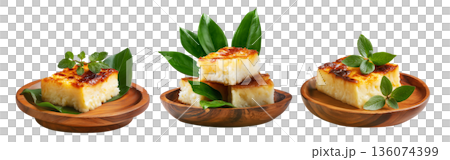 Cassava syrup-drenched semolina coconut cake pieces stacked and isolated on white background, concept of Fijian Cuisine Cassava syrup-drenched semolina coconut cake pieces stacked and isolated on white background, concept of Fijian Cuisine 136074399