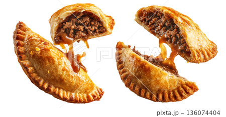 Australia meat pie with minced beef and gravy and crisp flaky crust isolated on white background. Concept of homemade comfort food Australia meat pie with minced beef and gravy and crisp flaky crust isolated on white background. Concept of homemade comfort food 136074404
