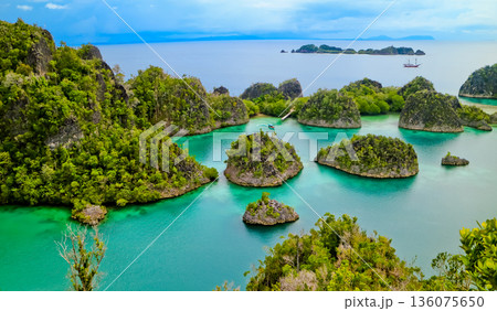 Beautiful views of the Raja Ampat Islands, West Papua, Indonesia Beautiful views of the Raja Ampat Islands, West Papua, Indonesia 136075650