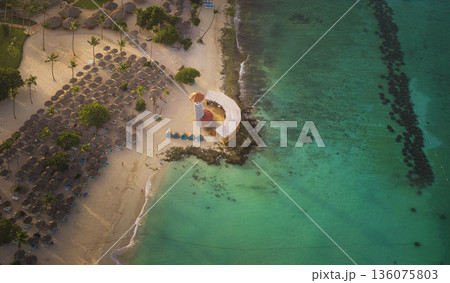 Top view of lighthouse on Bayahibe beach with turquoise water 136075803