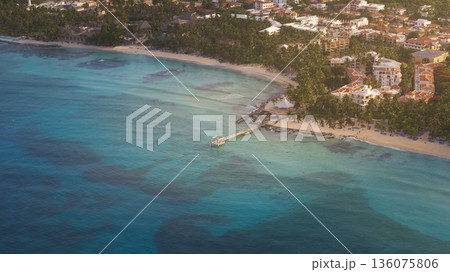 Aerial shot of a sandy beach and Caribbean Sea background luxury resort 136075806