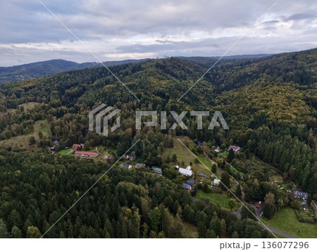 Hilltop Cottages Scene, Charming Hillside Houses Amidst Twisted Country Roads And Lush Forest Areas Hilltop Cottages Scene, Charming Hillside Houses Amidst Twisted Country Roads And Lush Forest Areas 136077296