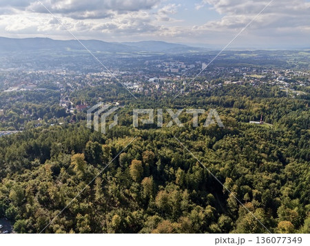 An Image Capturing Coexistence Of Urban Architecture And Vibrant Natural Landscapes During Midday An Image Capturing Coexistence Of Urban Architecture And Vibrant Natural Landscapes During Midday 136077349