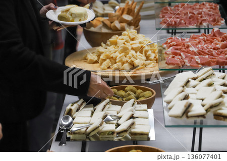 catering buffet for events with food and drinks. close-up of a buffet with appetizers 136077401